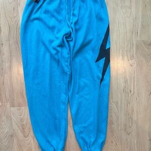 Aviator Nation Blue Track Joggers with Black Lightning Bolt